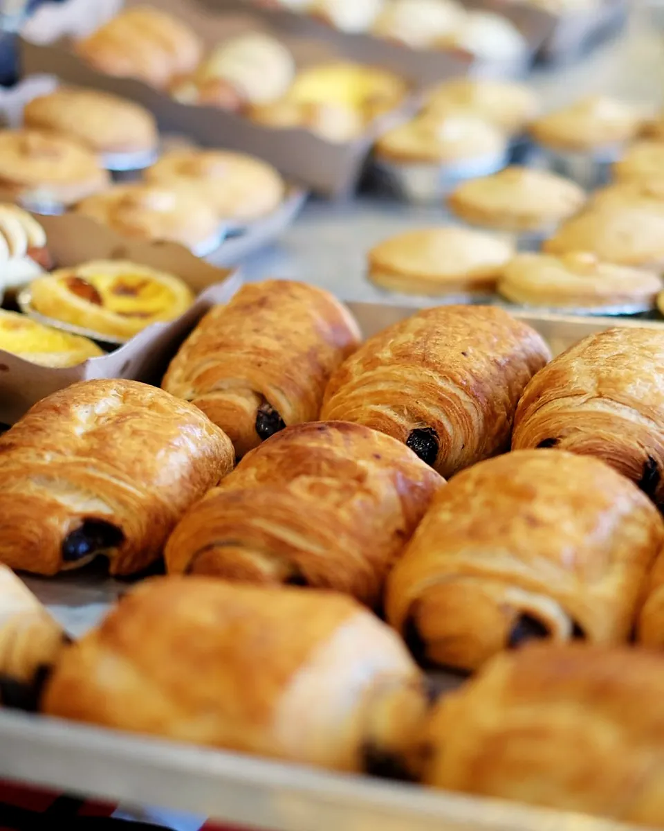 A tray of pains au chocolat fresh from the oven