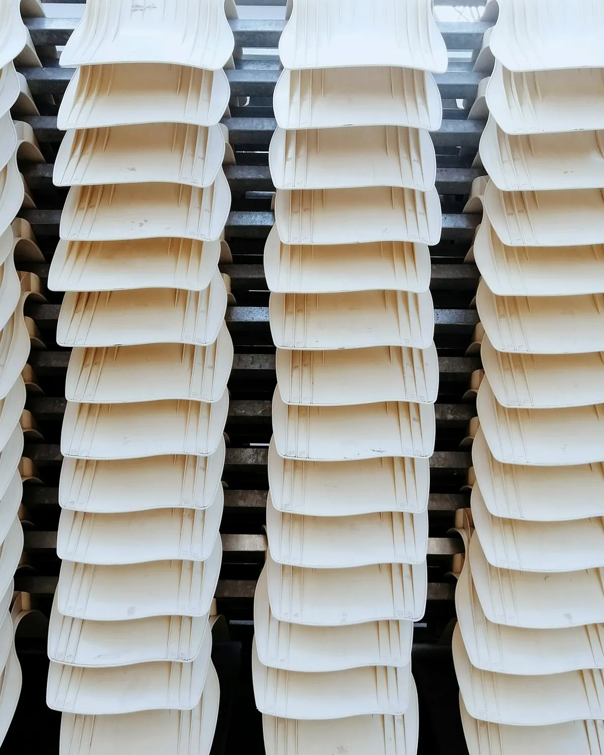 Sheets of paper drying on a ball rack.