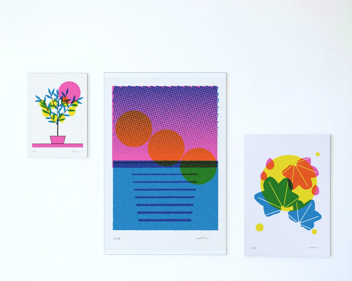 Three unframed prints on a white wall, Lemon tree, Three suns and Fig leaves.