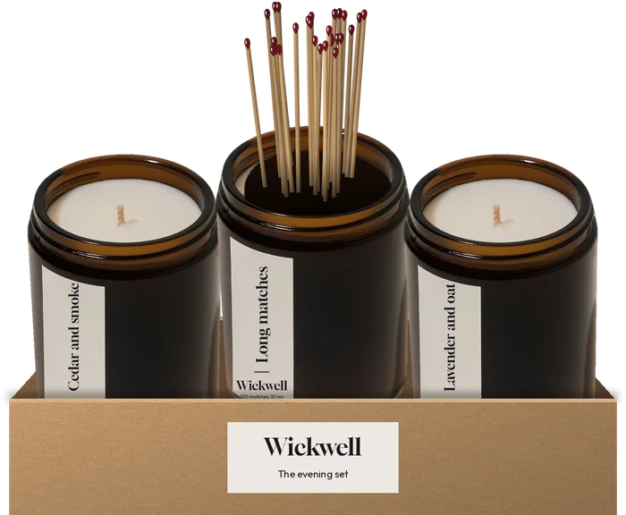 Two candles and a jar of matches packed in a kraft box