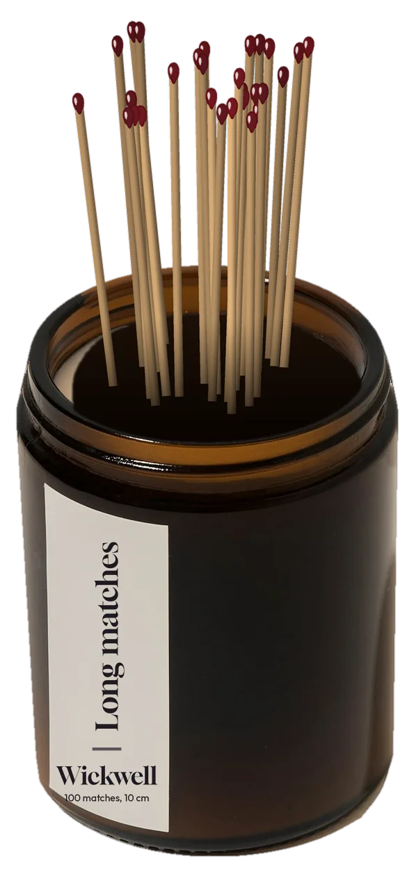 Long matches with dark red heads standing in an amber jar with a Wickwell label